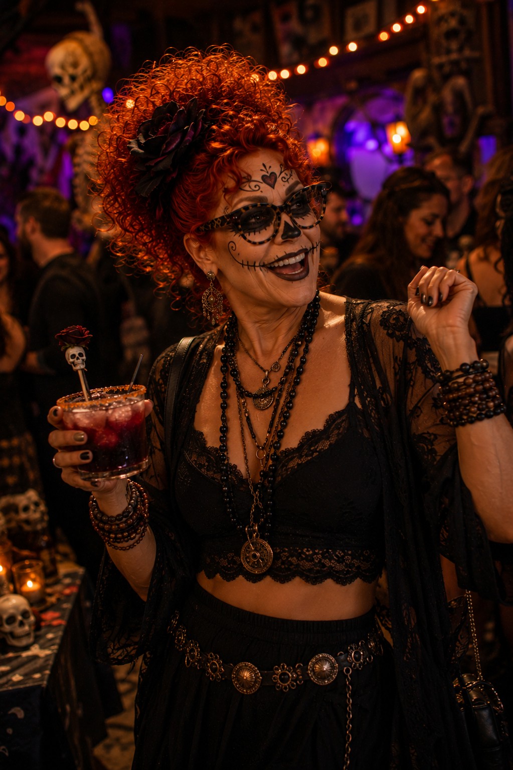 Winnie in sugar-skull-inspired Halloween face paint, laughing at a costume party lit with purple and orange light